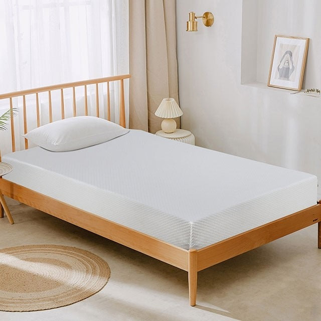 Wooden bed with a mattress in a bedroom setting